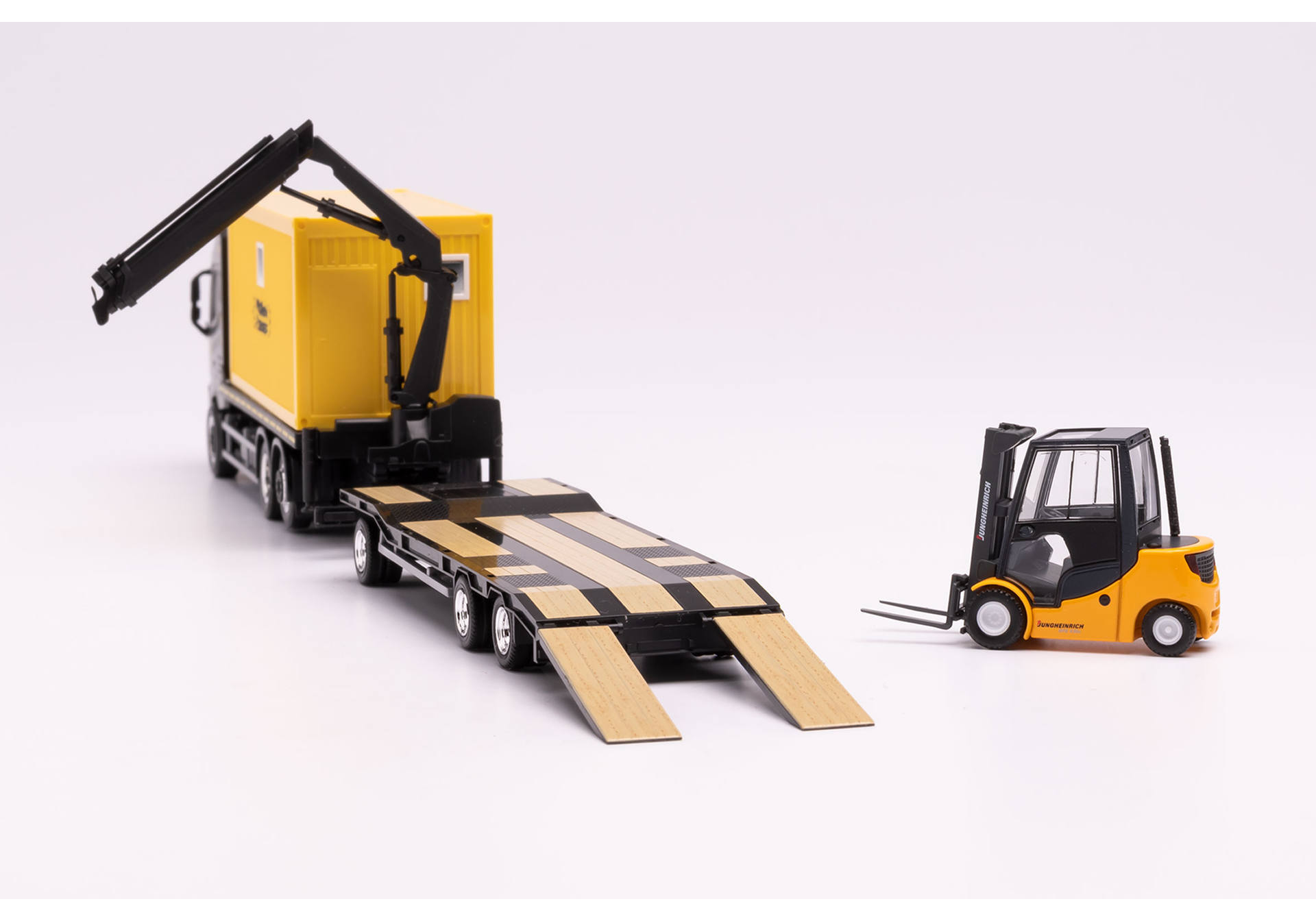 Volvo FH Gl. flat truck with container and crane and Goldhofer TU3 with fork lift „Wallek & Geser“