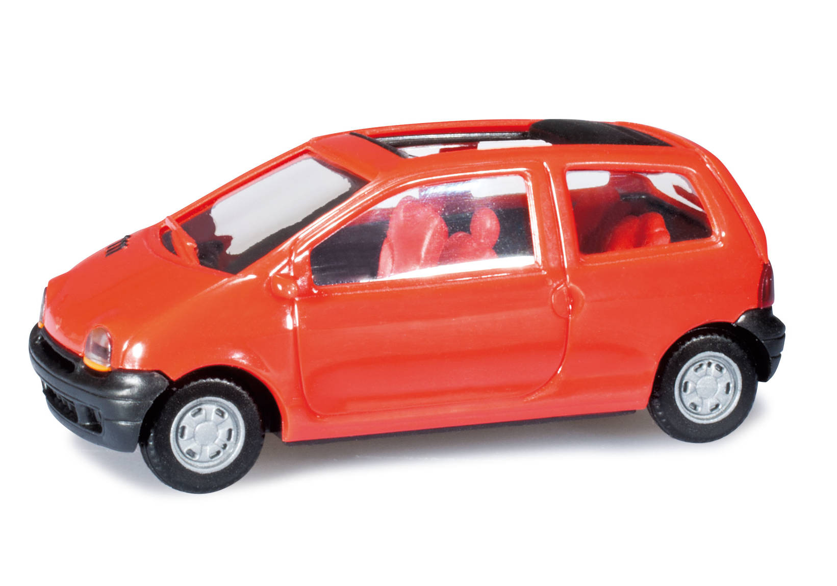 Renault Twingo, with folding top open, light red