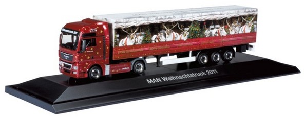 MAN TGX suitcase saddle train