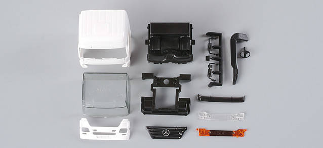 Mercedes-Benz Actros LH ´02 driver's cabin without side skirting (incl. rear-view mirror) grill comes separatelyContent: 2 pcs.