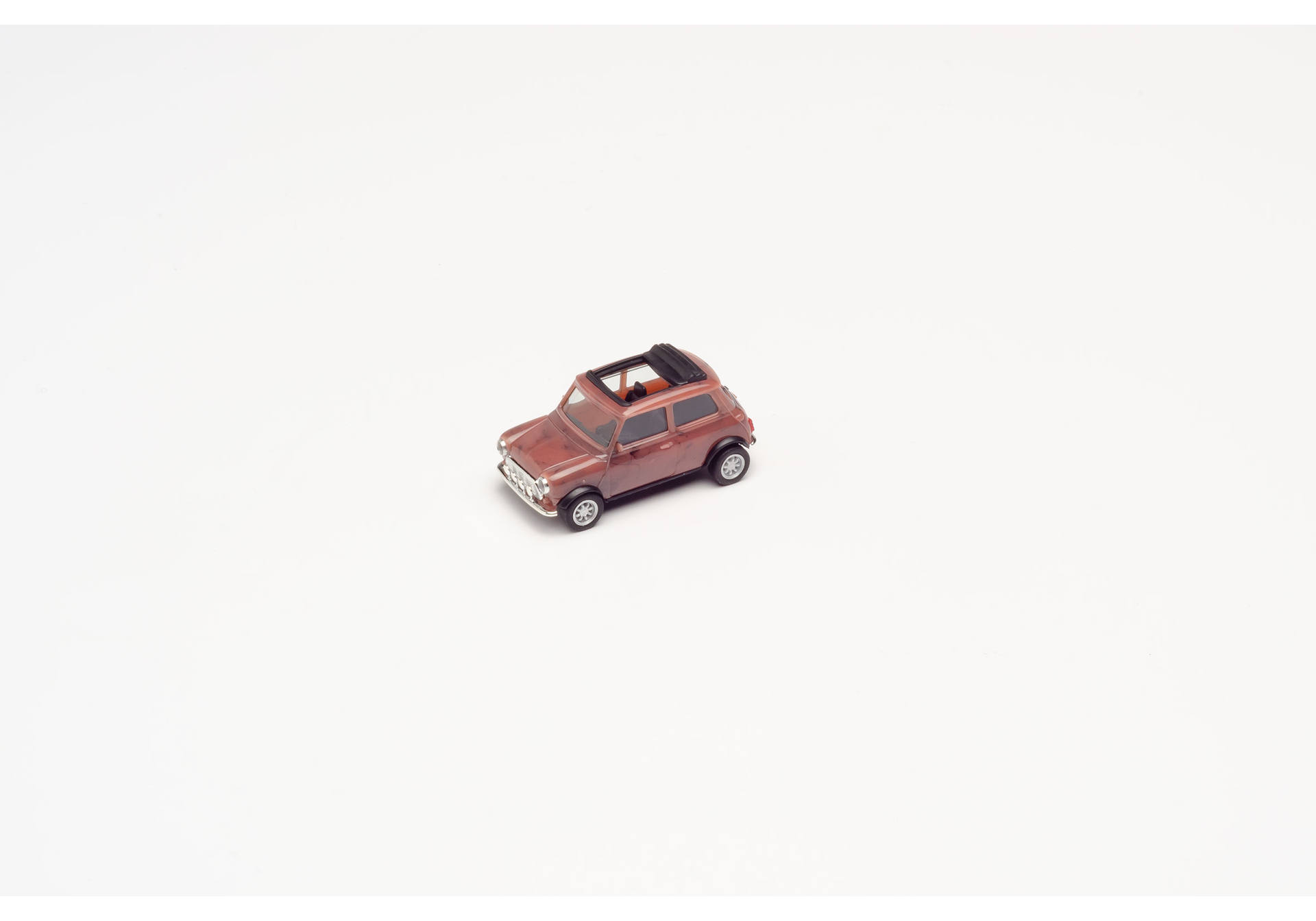 Mini Cooper mit Zusatzscheinwerfern, marmoriert
