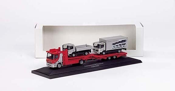 Mercedes-Benz Actros L '02 car transporter hanger train loaded with two Atego ´04 truck special box