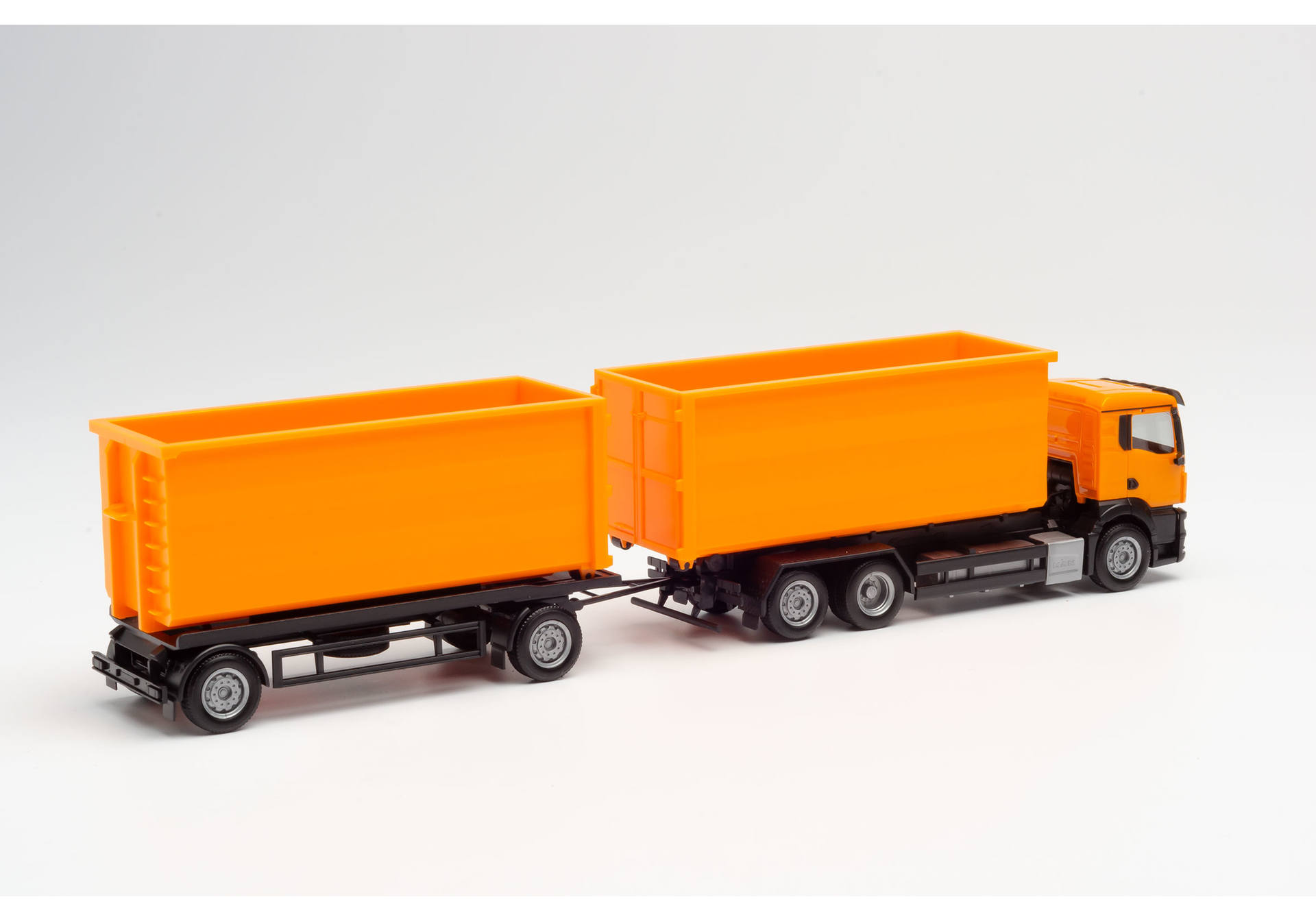 roll-off containert ruck with trailer, communal orange H0 1/87 H0 1/87 H0 1/87 312448 39,95 € Scania CR 20 HD Kühlkoffer-Hängerzug / Scania CR 20 HD refrigerated box truck with trailer „Müll