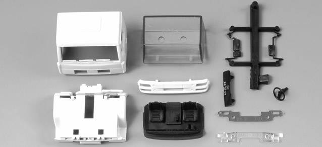 MAN LE2000 driver's cabin without raised roof and sun shield (incl. rear-view mirror)Content: 2 pcs.