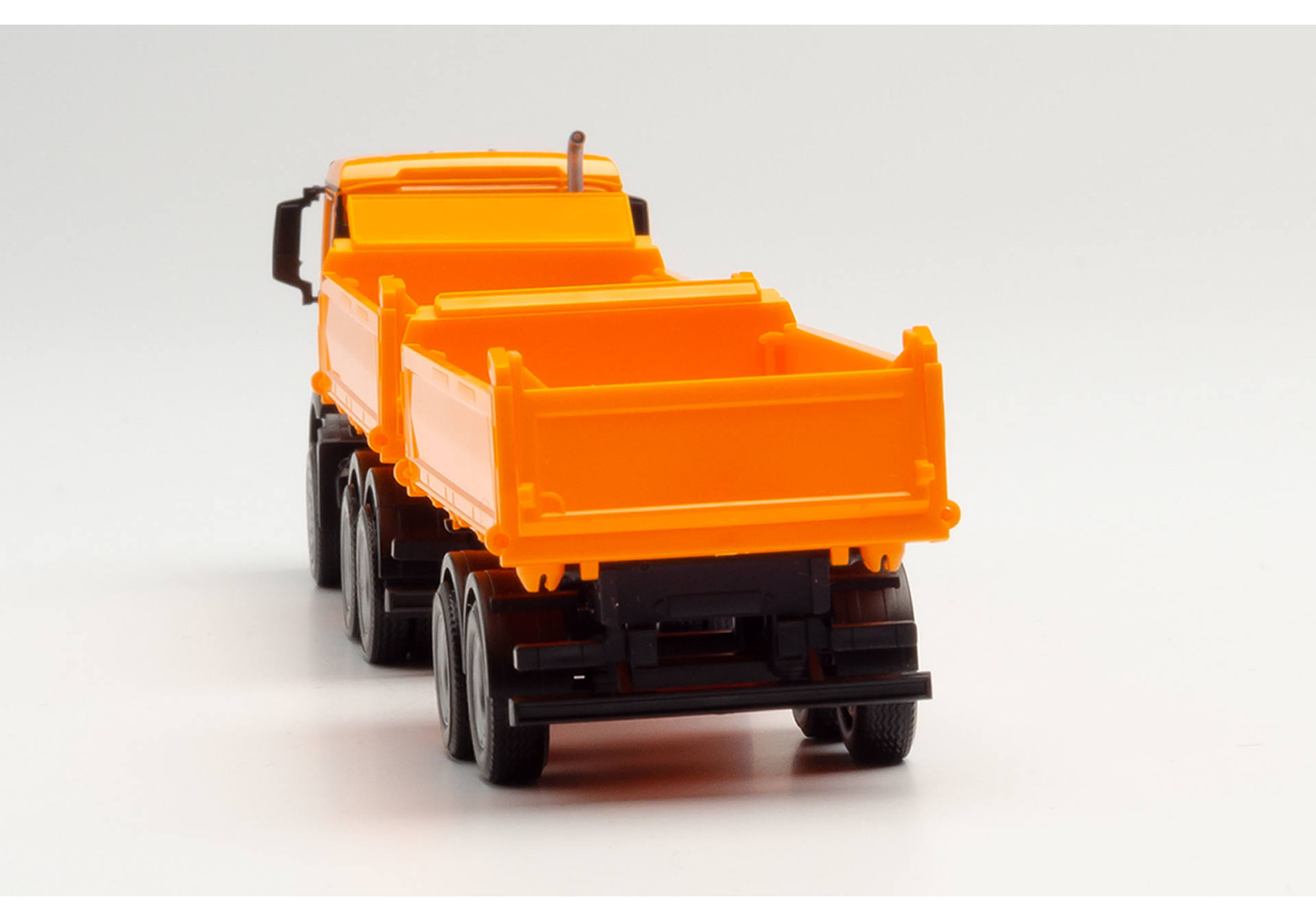 MAN TGX NN tandem construction tipper trailer truck, municipal orange